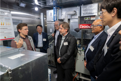 student working on cold-climate heat pump